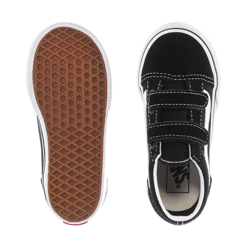 Toddler sneaker outsole and inside view; black upper with beige logo label
