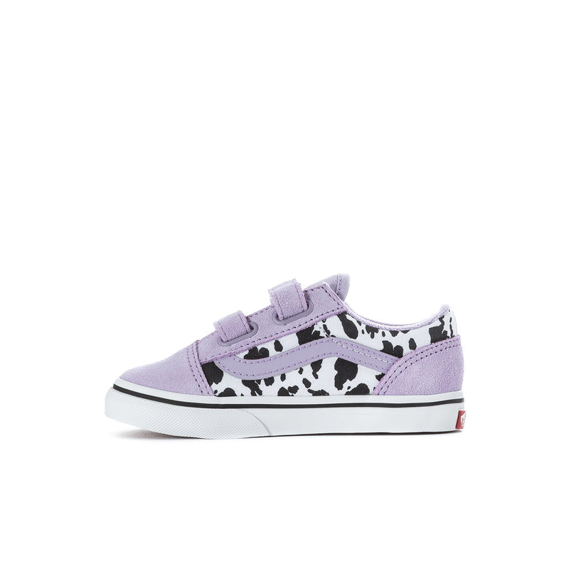 Toddler sneaker side view in soft purple with cow-print detail and hook-and-loop strap