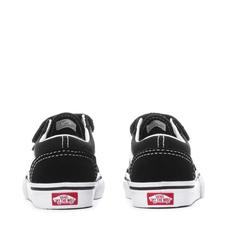 Toddler low-top sneaker back view, black heel with white sole and Vans label