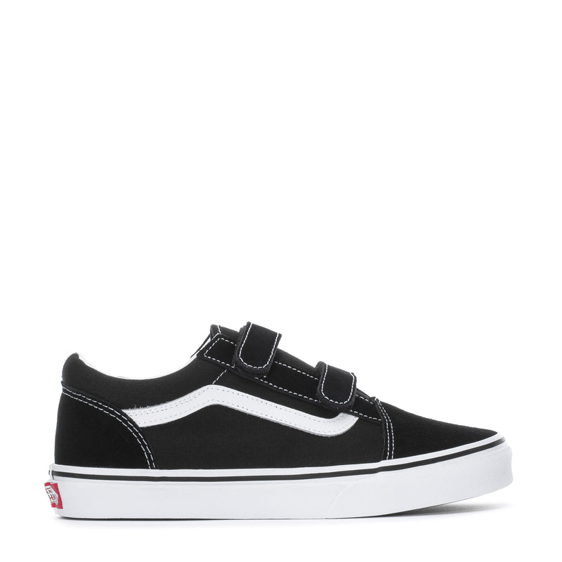 Youth black and white skate shoe with Velcro strap and white side stripe