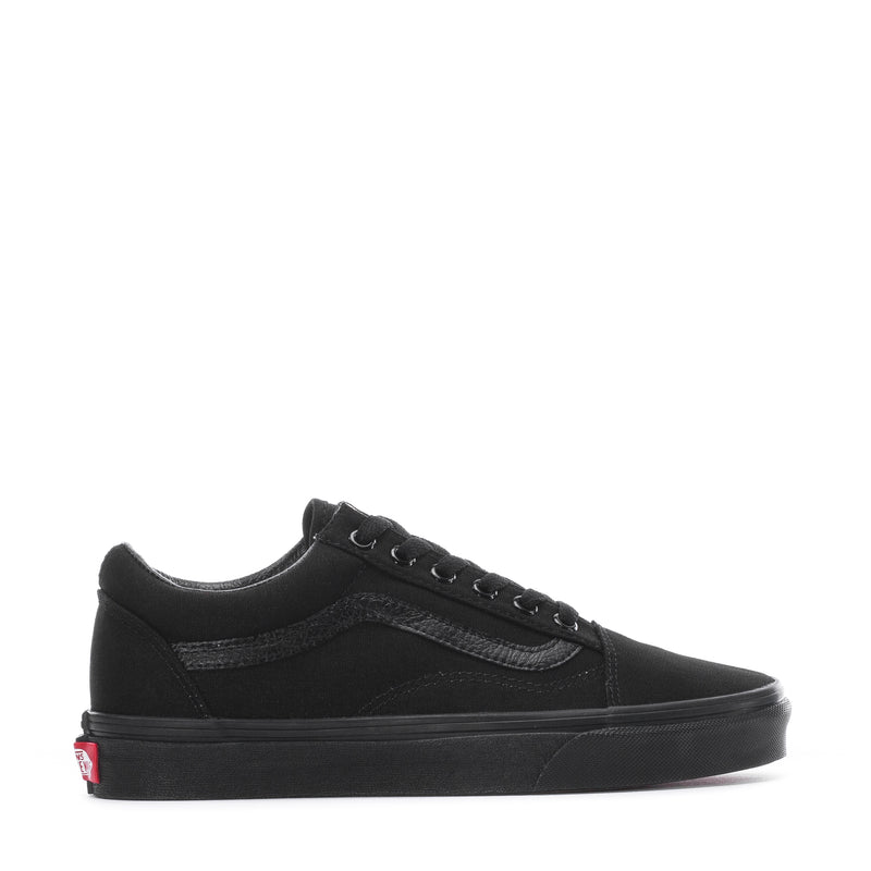 Black youth low-top canvas sneakers, lace-up with side stripe and rubber sole