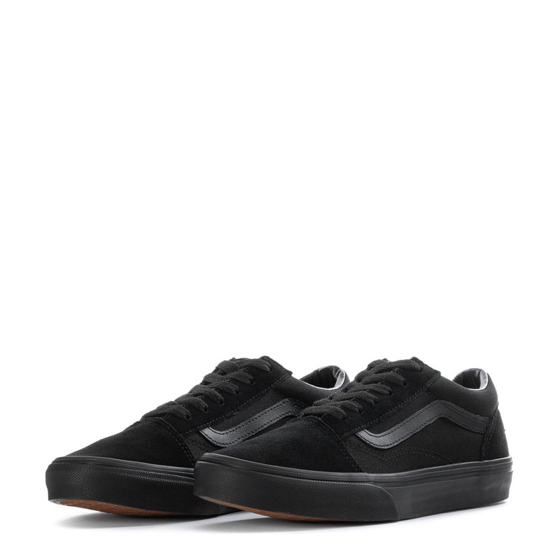 Pair of youth black lace-up skate sneakers with vulcanized rubber sole