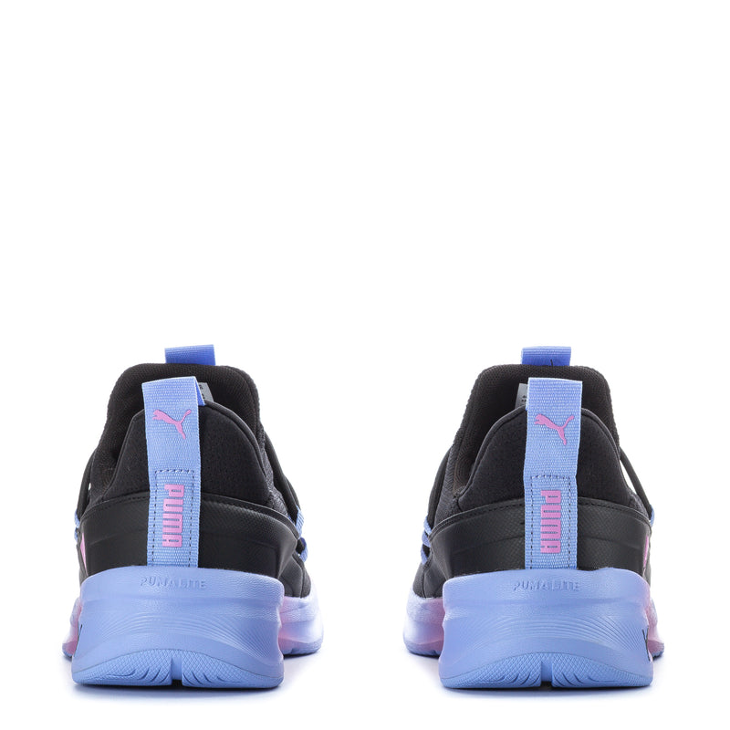Youth black sneakers rear view with heel pull tab, light blue and pink cushioned sole