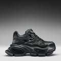 Black sneaker on a gradient gray background