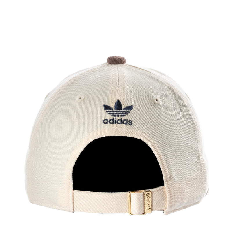 adidas Originals Terrace snapback cap with white fabric, adidas logo, and adjustable strap