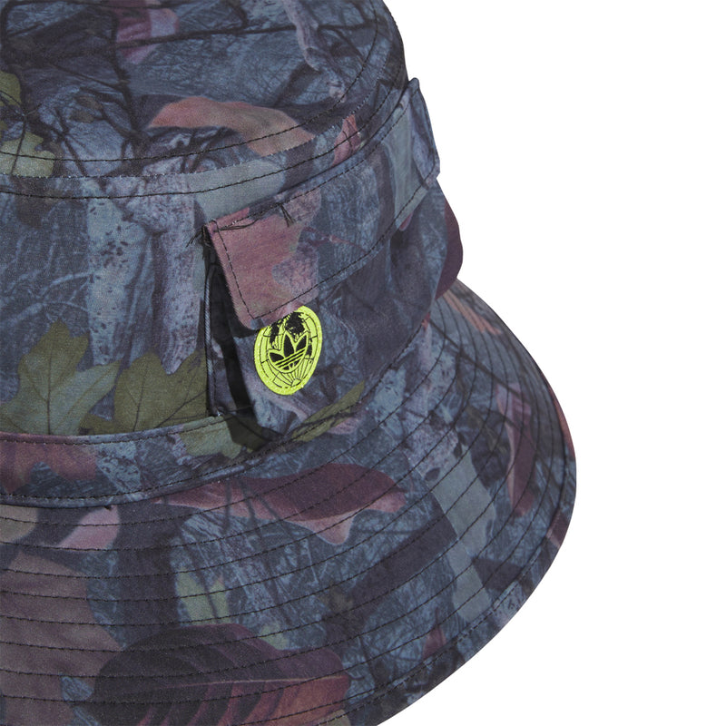 Close-up tree camo boonie hat with front logo patch and flap