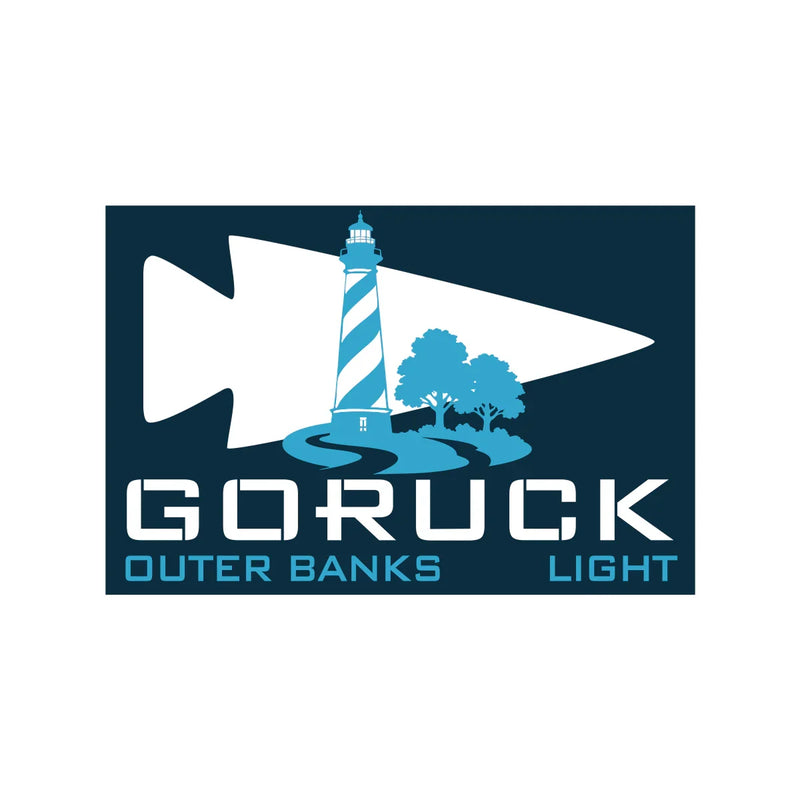 GORUCK Outer Banks Light logo with lighthouse, trees, and arrowhead graphic