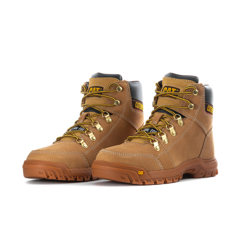 Caterpillar wheat steel-toe work boots with yellow laces and rugged tread profile
