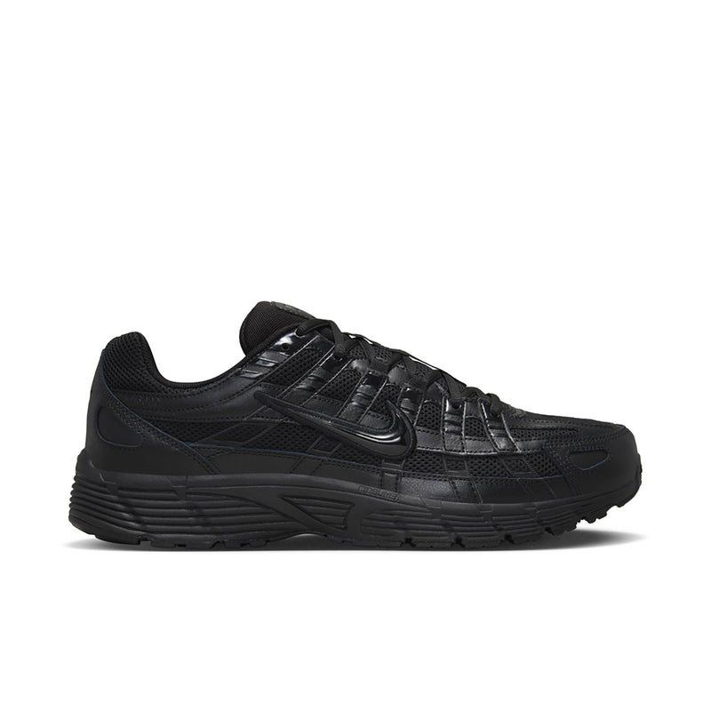 Men's black Nike running shoe with mesh upper and swoosh logo
