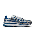 Men's blue-and-silver lace-up sneakers with patterned panels and rubber outsole