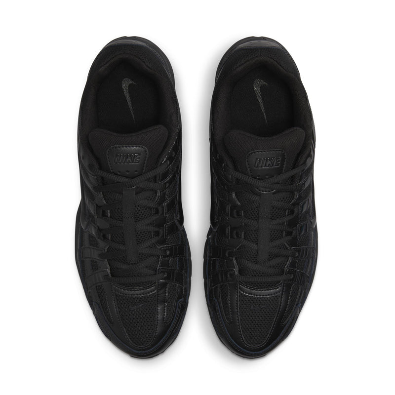 Men's black Nike lace-up shoes with Nike logo on the heel lining