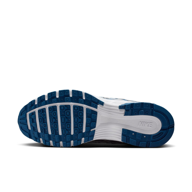 Men's sneaker outsole with dark blue tread and white platform sole