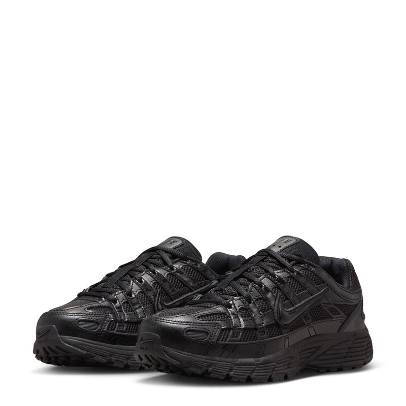 Black pair of lace-up sneakers with cushioned sole and stitched overlays