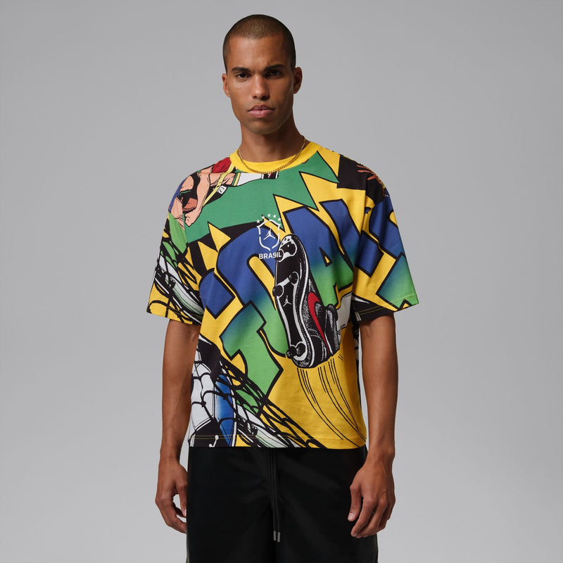 Men's multicolor graphic crewneck T-shirt with ribbed collar, worn with black shorts
