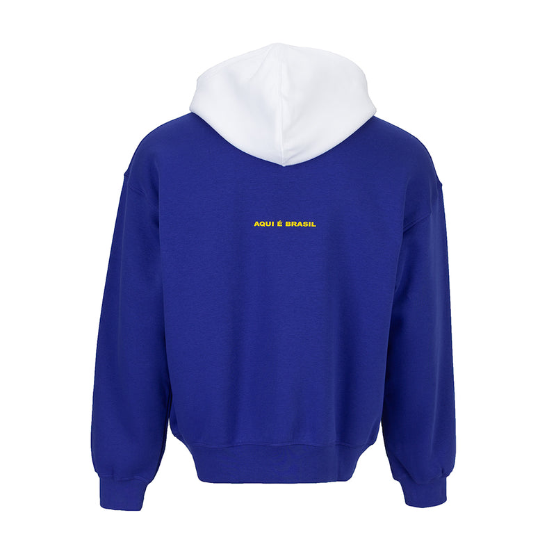 Royal blue fleece pullover hoodie with white hood lining and small back Brasil text