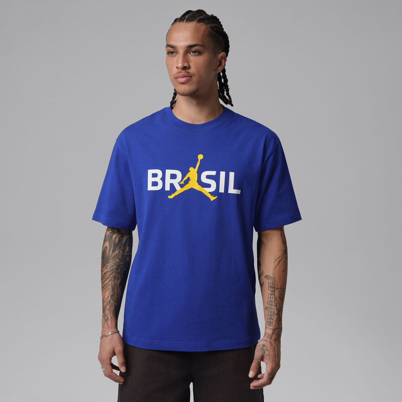 Men's blue crew-neck T-shirt with Brazil logo front, worn by model