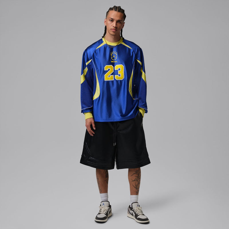 Men's royal blue goalie top with yellow accents, number 23, long sleeves.