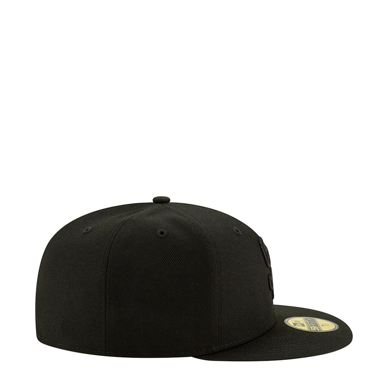 Black baseball cap, side view with small stitched logo