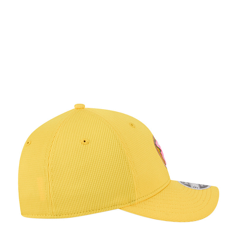 Yellow baseball cap side profile with curved brim and small embroidered details