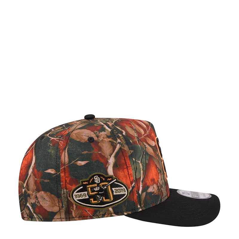 Two-tone A-frame cap with leaf camo pattern, front oval patch logo, black curved bill