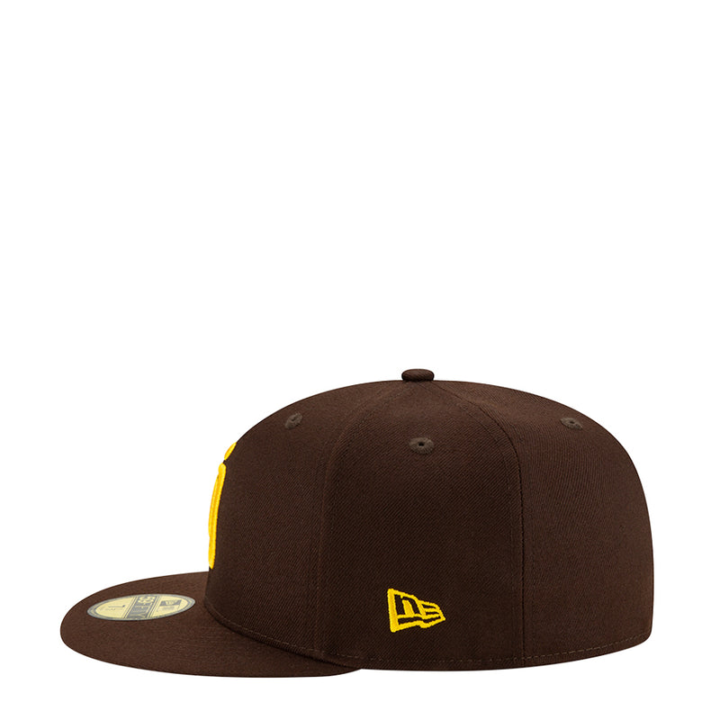 Brown baseball cap with yellow embroidered icon on side