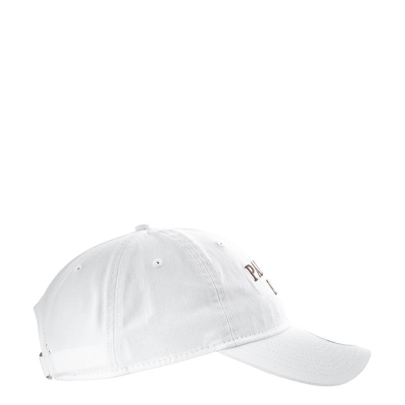 White baseball cap with small side embroidered lettering and curved brim