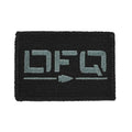 GORUCK black embroidered patch with stylized grey lettering and arrow design