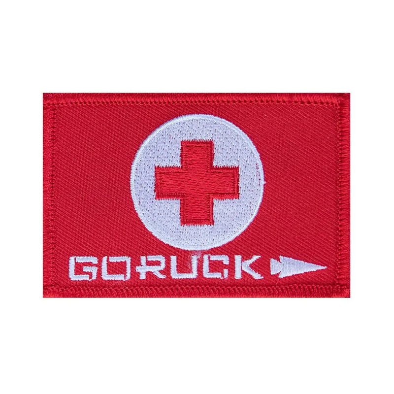 GORUCK red first aid patch with white cross and logo, durable rucking gear accessory