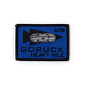 Show off your achievement with the Patch - HEAVY MILE: a blue and black design featuring a rucksack icon and "60" in the top right—ideal for any ruck challenge or Heavy Mile event.