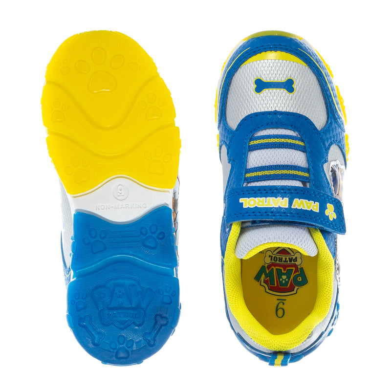 Toddler Paw Patrol sneakers rubber outsole, blue and yellow tread and heel view