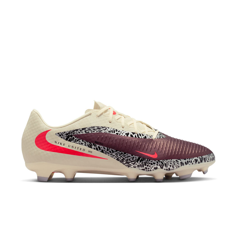 Men's low-cut soccer cleat in cream and burgundy with red swoosh and patterned side