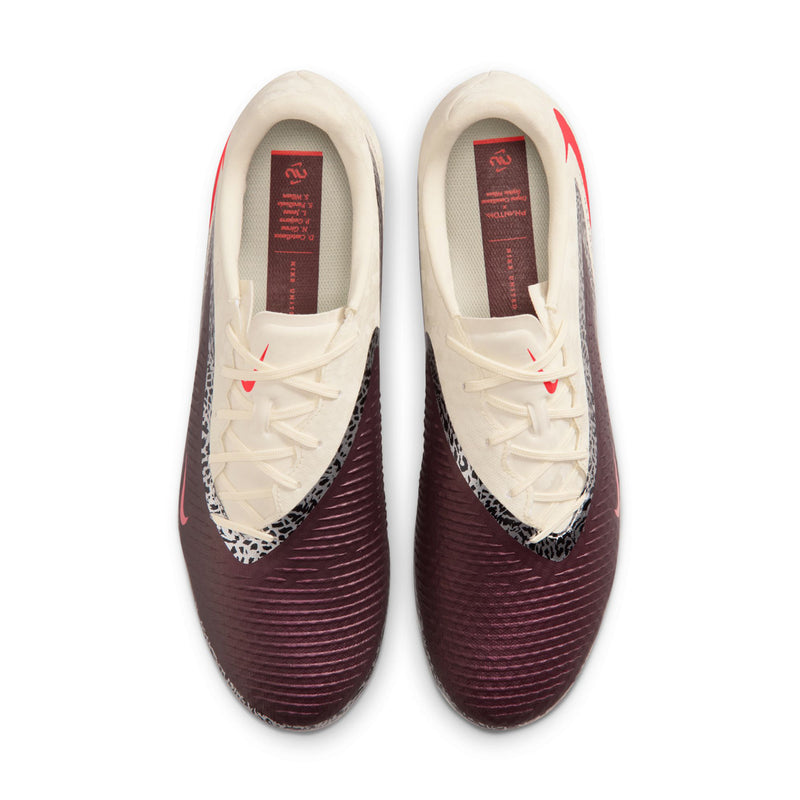 Pair of men's soccer cleats front view with cream laces and burgundy forefoot