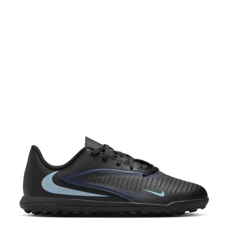 Youth low-top soccer turf shoes, black upper with blue Nike swoosh and laces