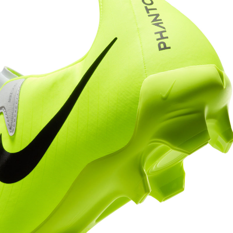 Men's FG soccer cleat upper close-up in volt green with black swoosh and 'PHANTOM' text.