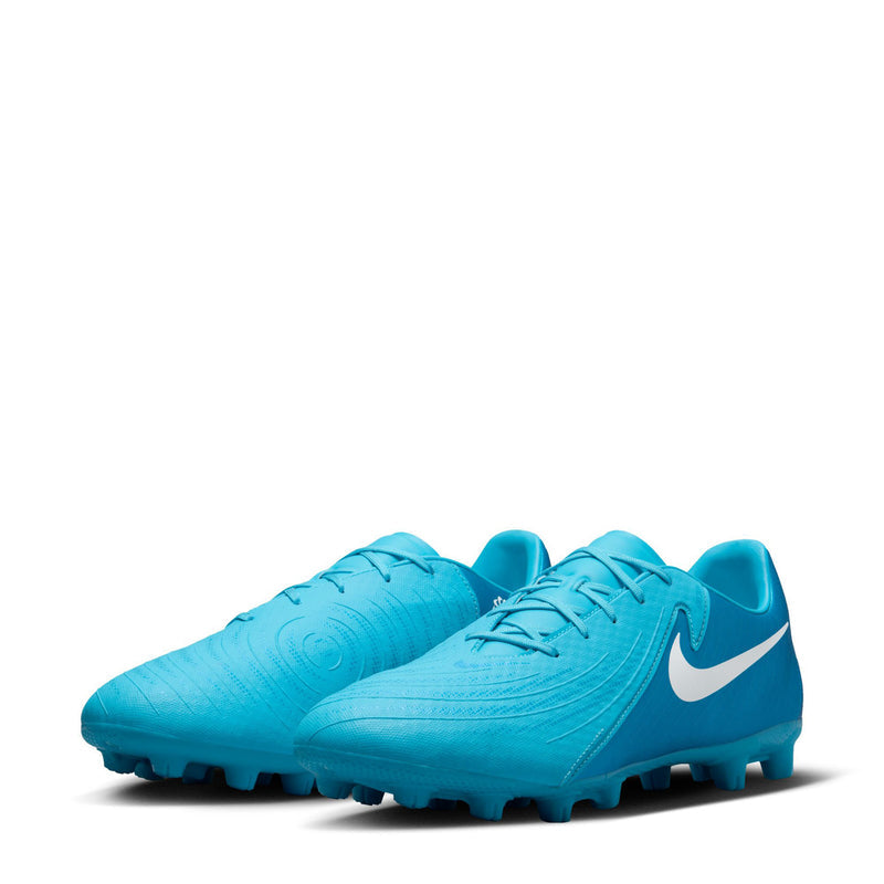 Turquoise blue lace-up soccer cleats with textured upper and Nike swoosh