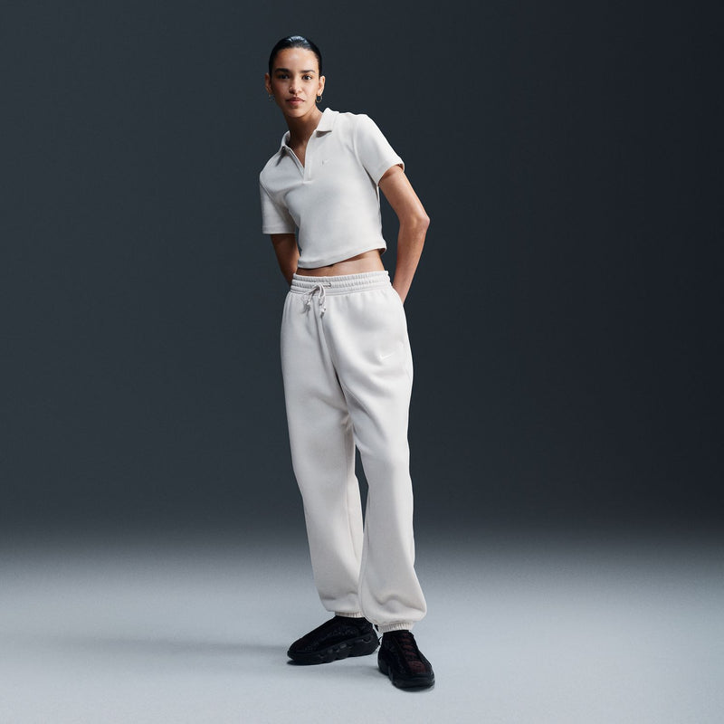 Women’s off-white jogger pants, front full-body: elastic waistband with drawstring, side pockets