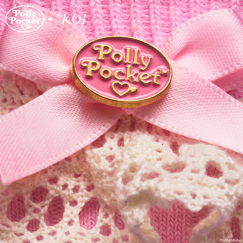 Pink bow with 'Polly Pocket' logo on a textured pink background