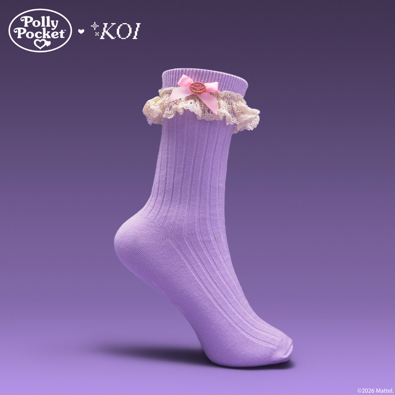Purple sock with floral lace top on a purple background, featuring Polly Pocket branding.
