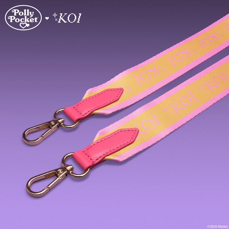 Pink and yellow strap with gold clasps on a purple background, featuring Polly Pocket and KOI logos.