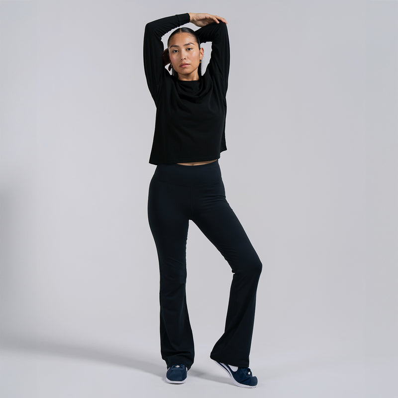 Black women’s flare leggings with high-rise waistband and flared bootcut legs