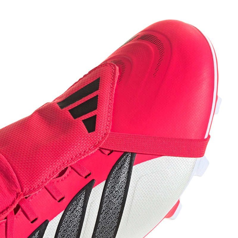 Men's soccer cleats close-up of red textured upper and black lace-eyelets