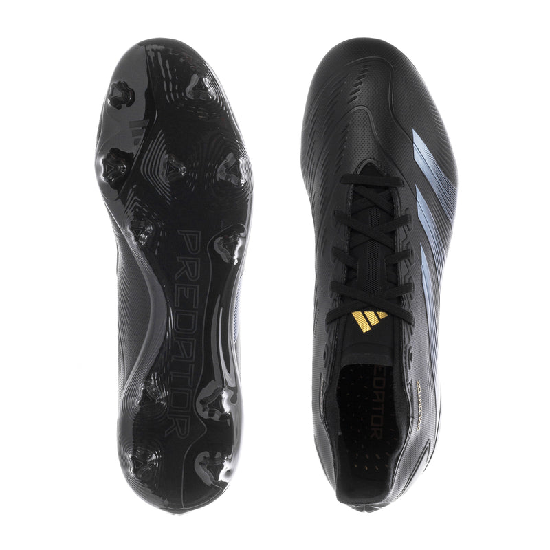 FG soccer cleats shown from sole with molded studs and black textured surface