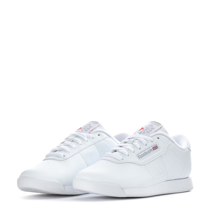 Women's white wide sneakers, pair close-up with laces and side panel