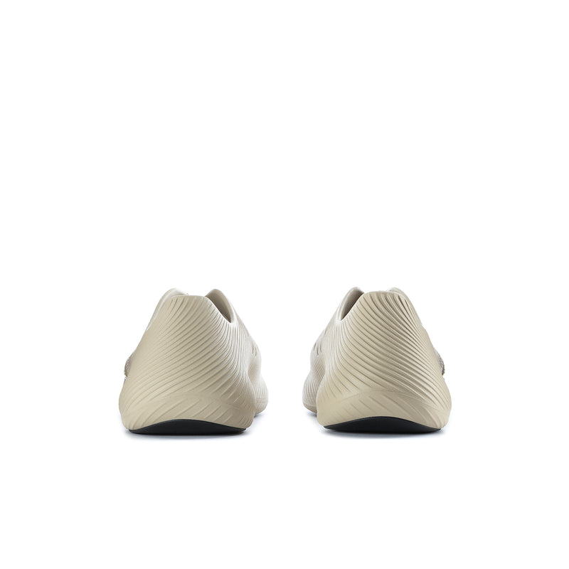 Men's khaki slip-on sneakers, heel view with smooth rear and dark sole