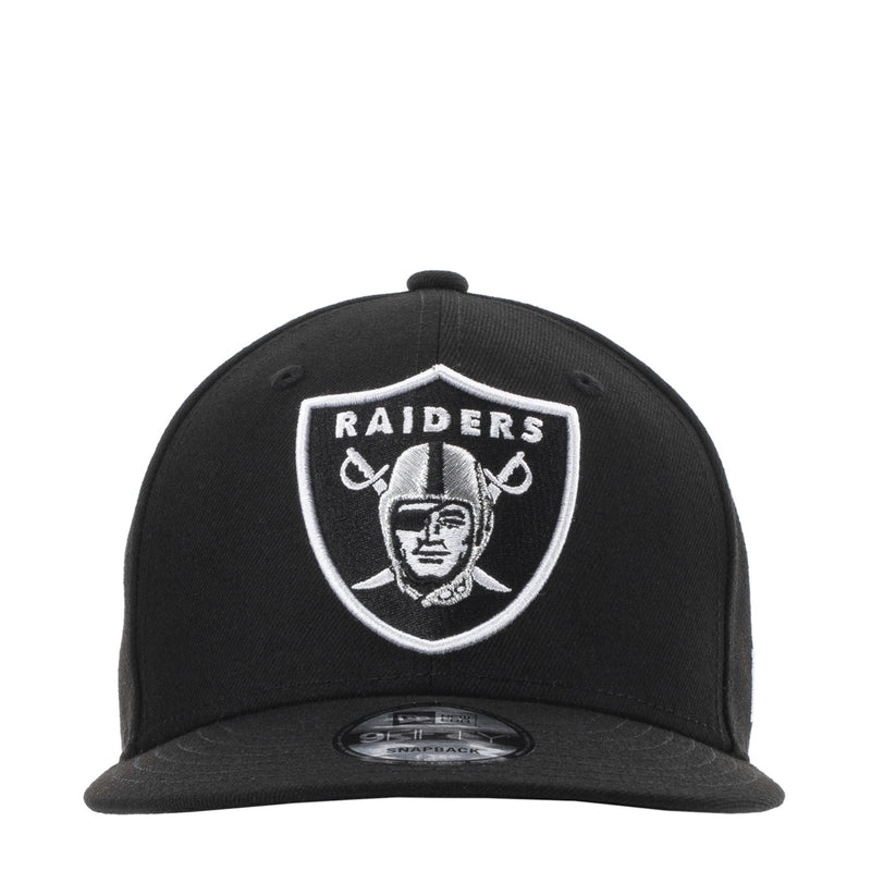 Black snapback cap with Raiders shield logo at front in contrast white outline