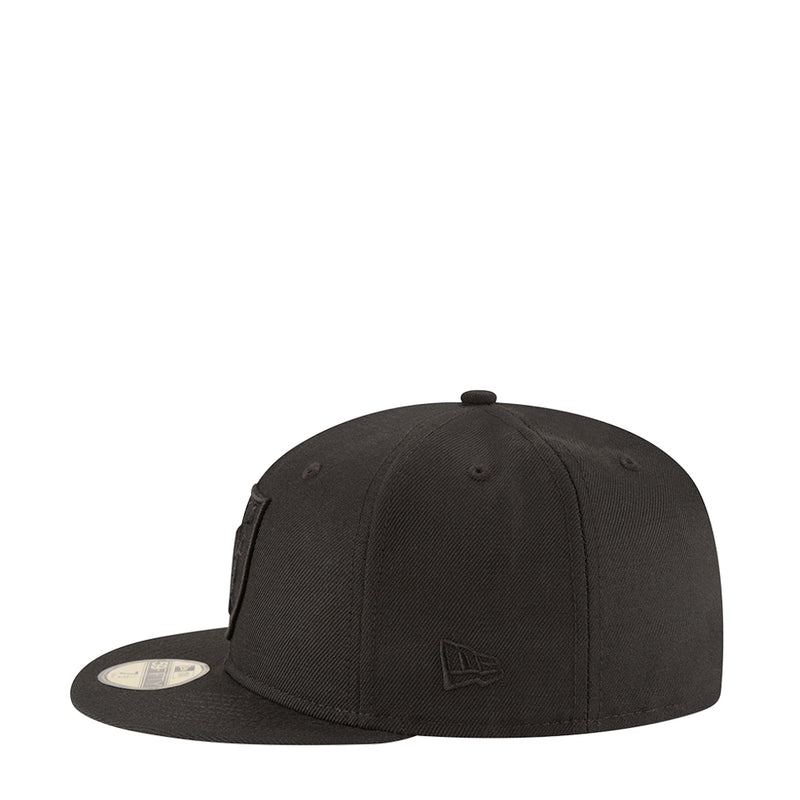 Black Raiders baseball cap, side view with New Era flag logo and curved brim