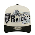 Two-tone A-frame cap in cream and black with Raiders graphic front patch