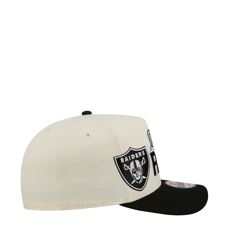 Cream and black two-tone A-frame cap with Raiders shield patch on side
