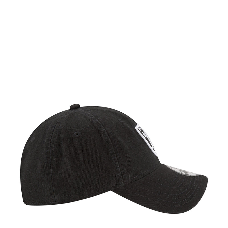 Black Raiders baseball cap, side view with white embroidered Raiders shield