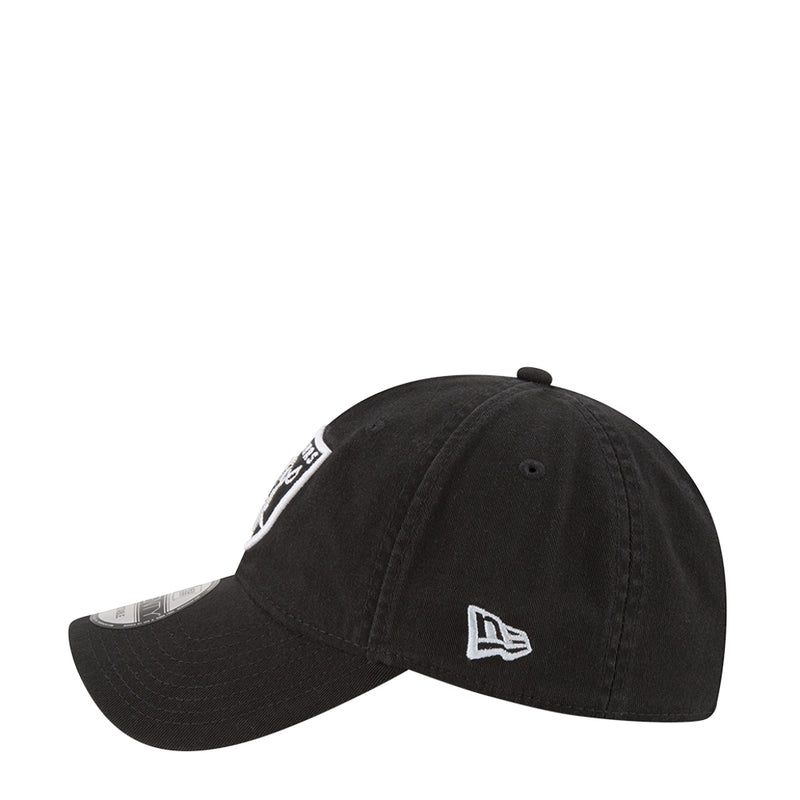 Black Raiders baseball cap with New Era flag and white Raiders shield patch